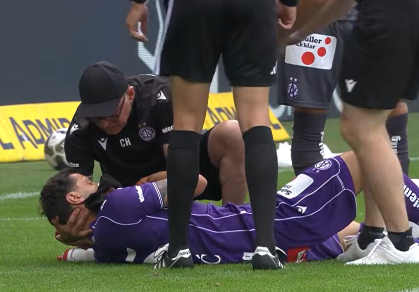 KRV, MUK I DRAMA U BEČU! Dragović ostao nepomično da leži posle jezivog udarca, stadion zanemeo! Bivši kapiten Zvezde hitno prebačen u bolnicu! (VIDEO)